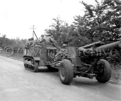 M5_Artillery_Tractor_towing_115_mm_gun.jpg